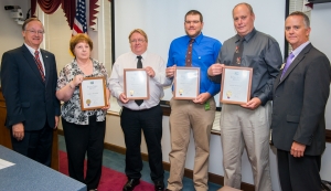 Pictured from left to right: Transportation Secretary Nick Tennyson with Extra Mile Award winners Teresa Skinner, David Griffies, Thomas Jernigan, Keith Hurdle, and Division 4 Engineer Tim Little.