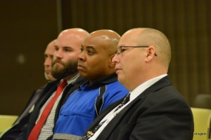 From right, Martin and investigators Gorton Williams, Chris Babb and Davis listen to Hasty.