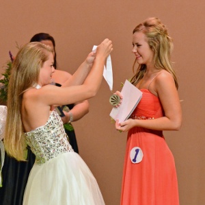Jessica Neville (2014 DYW winner) giving Brooke the 2015 DYW medallion.