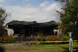 The house in the fire&#039;s aftermath.