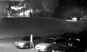 The alleged suspect captured on camera in the parking lot.
