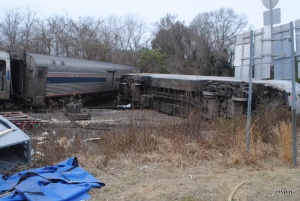 The two derailed cars.