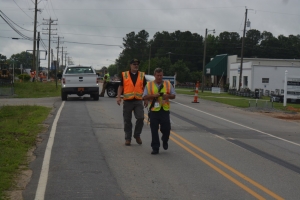 Coggins, right, and public works Director Larry Chalker at the scene.