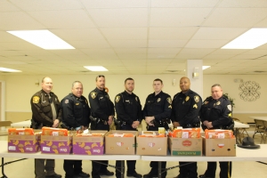 From left, Halifax County Deputy Sheriff R. Jenkins, Norton, Officer Chris Biggerstaff, Officer Obert Wiltsie, Master Officer Jonathan Benthall, Sergeant Terrence Tyler and Thomas Staton of the Gaston Police Department.