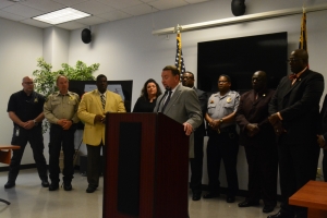 Higdon addresses officers and media today.