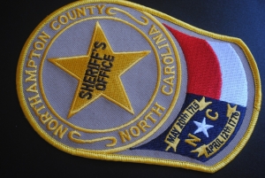 One on the lam, one charged in NCSO traffic stop