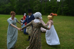 A period dance is demonstrated on the front lawn of Sally-Billy House.