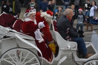 Mrs. Claus waves to the crowd during last year's parade.